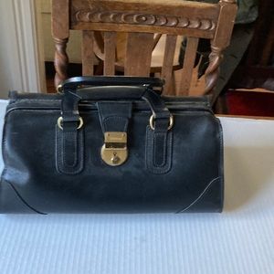 Schlesinger black leather doctor’s bag.
